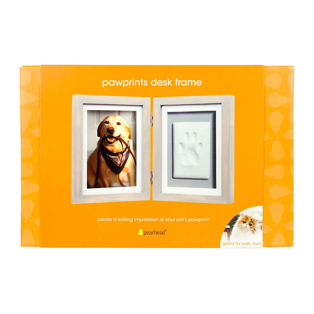 Pawprints desk frame packaging with a dog's pawprint and photo on an orange background